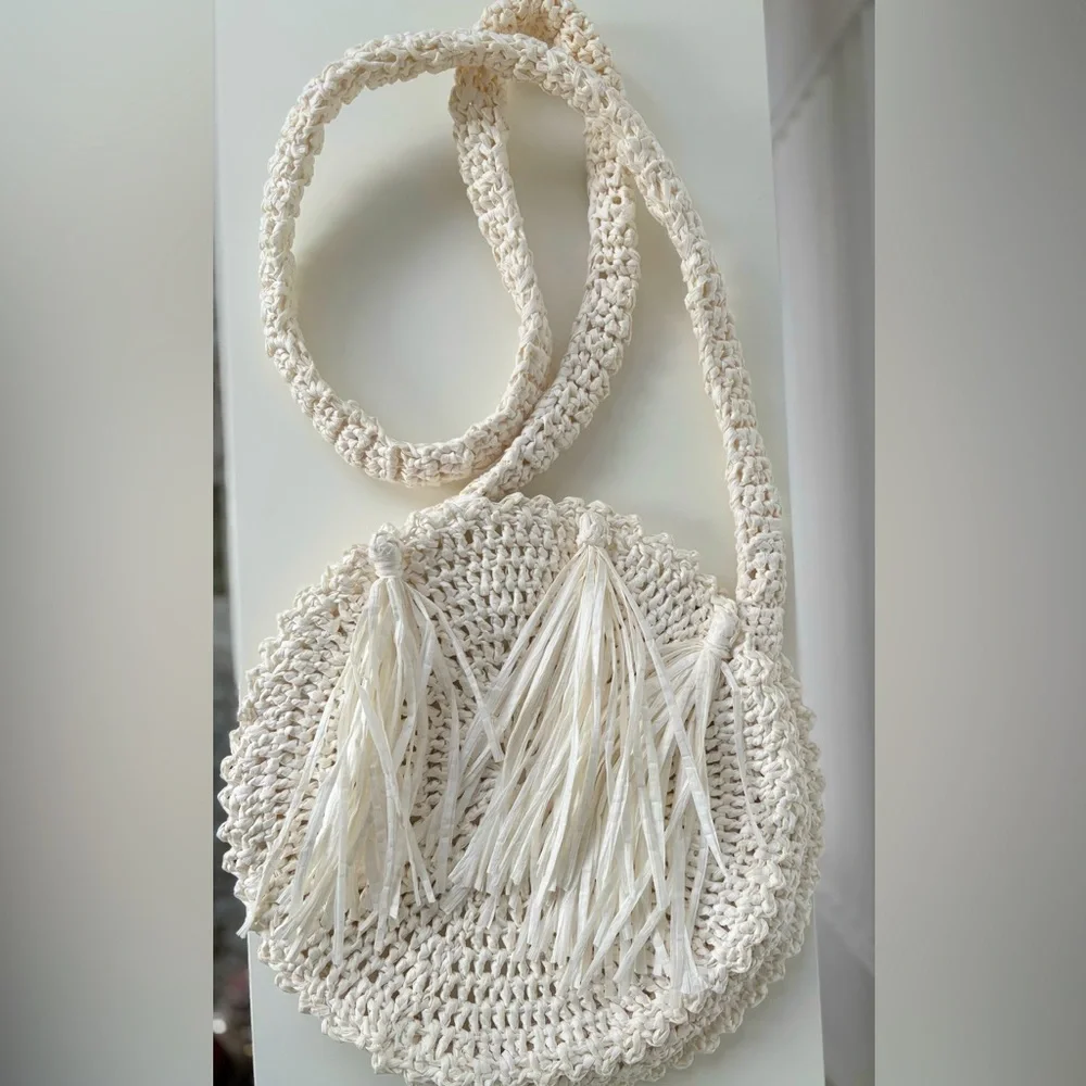 Light Beige Round Straw Fringe Bag Never Used. Beautiful bag